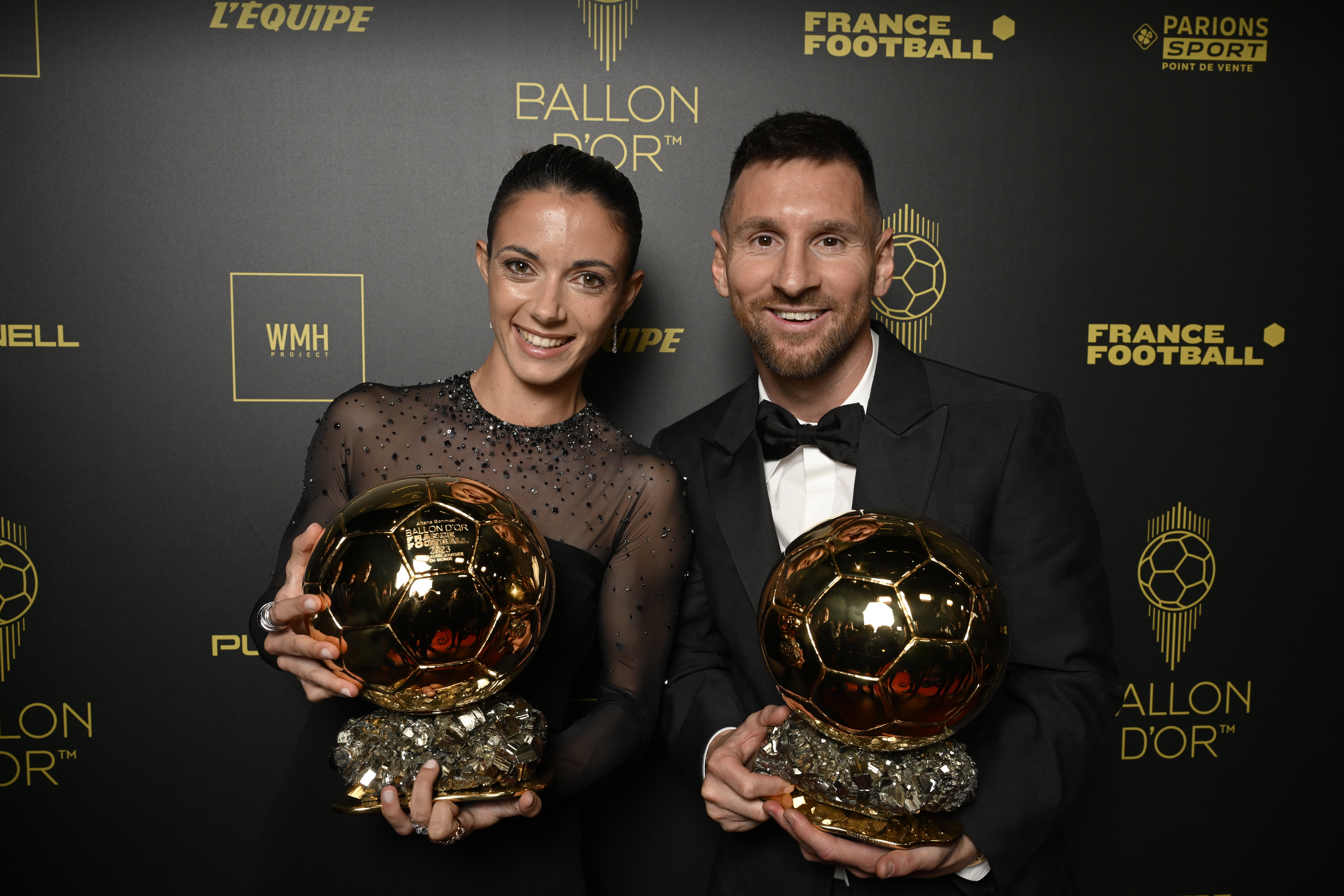 Aitana Bonmatí en Lionel Messi met de Ballon d'Or