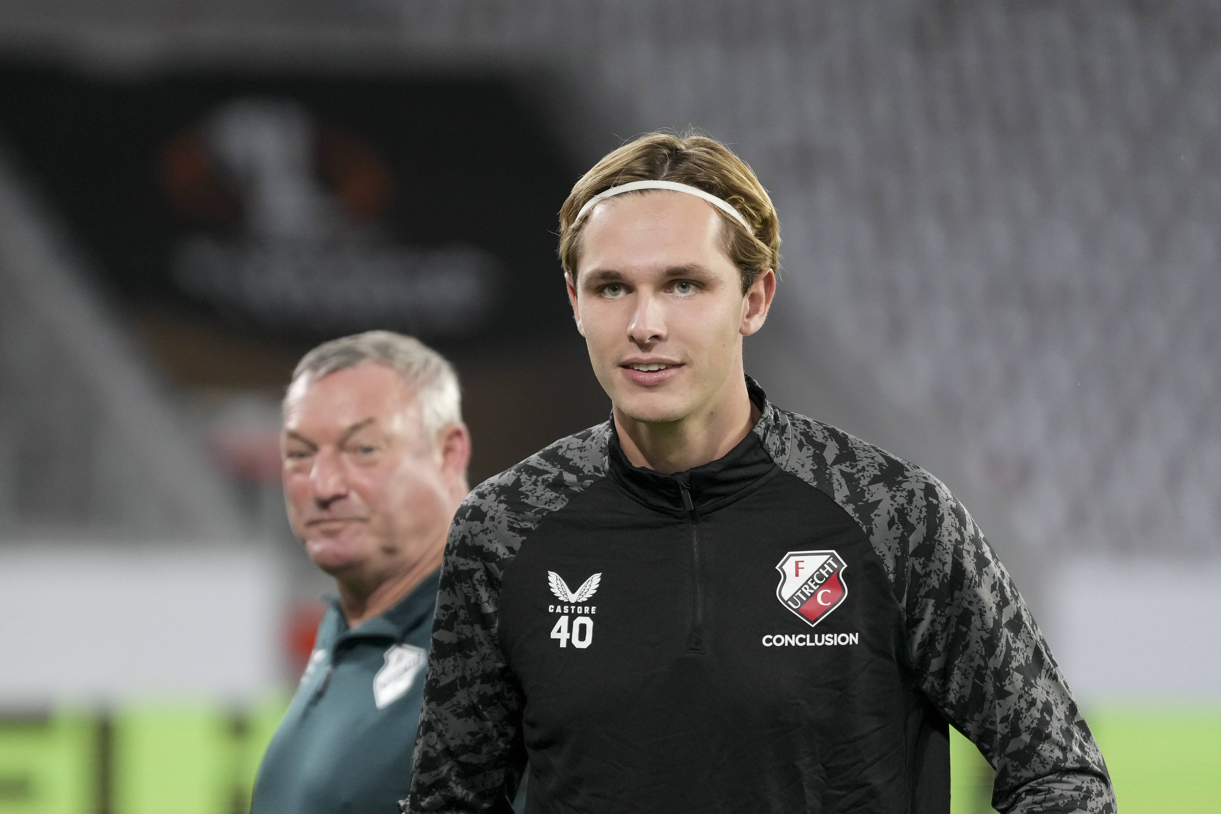 Matisse Didden met in de achtergrond Ron Jans
