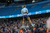 Kerstin Casparij juicht na haar goal voor Manchester City