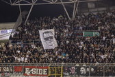 Ajax-fans met slechts een klein aantal vlaggen