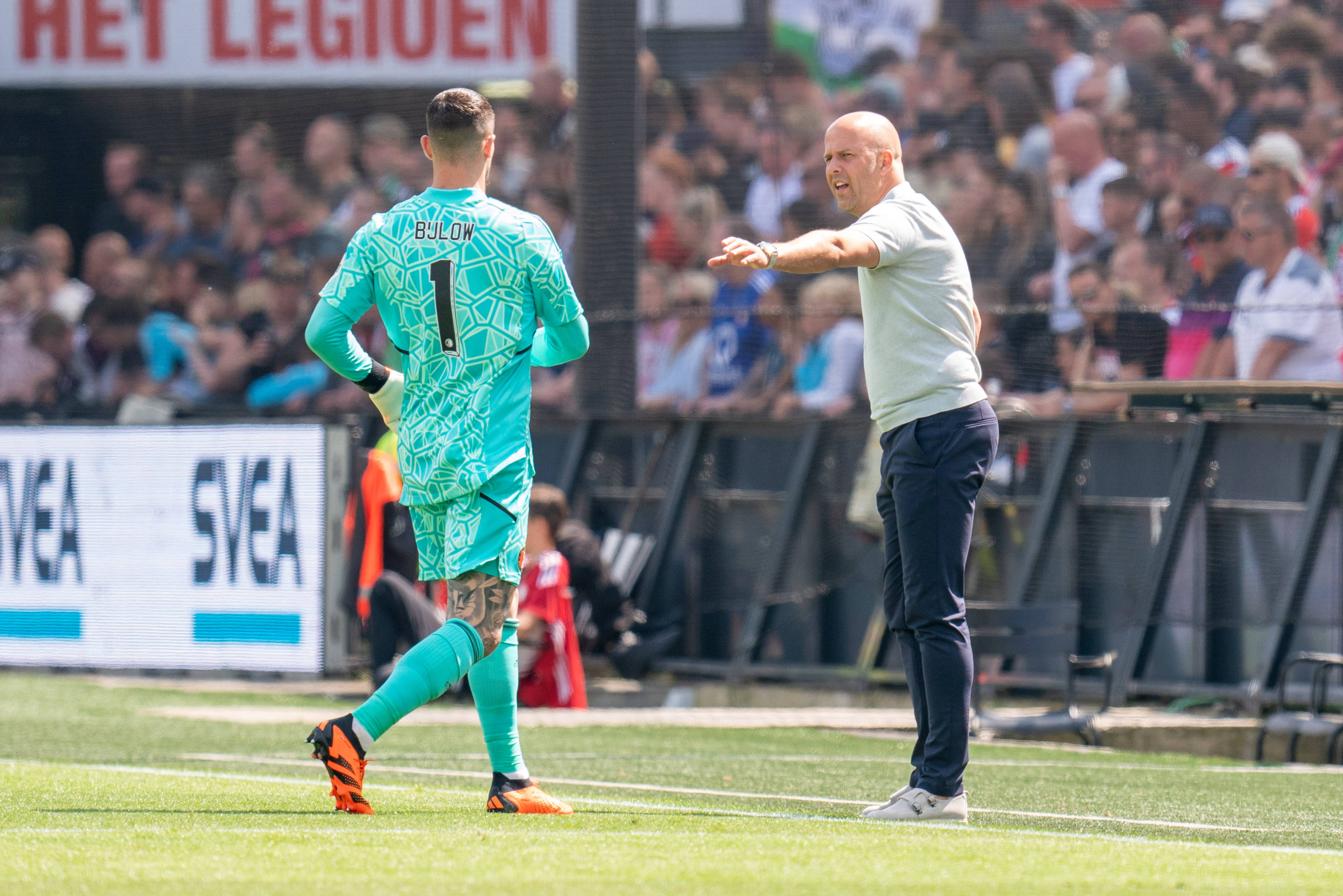 Arne Slot en Justin Bijlow