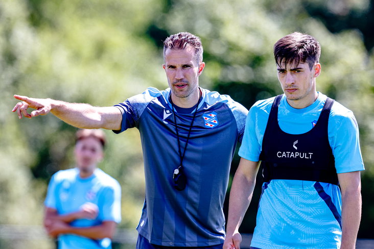 Robin van Persie en Ion Nicolaescu