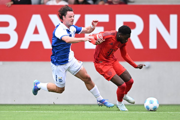 Dirk Abels en Alphonso Davies
