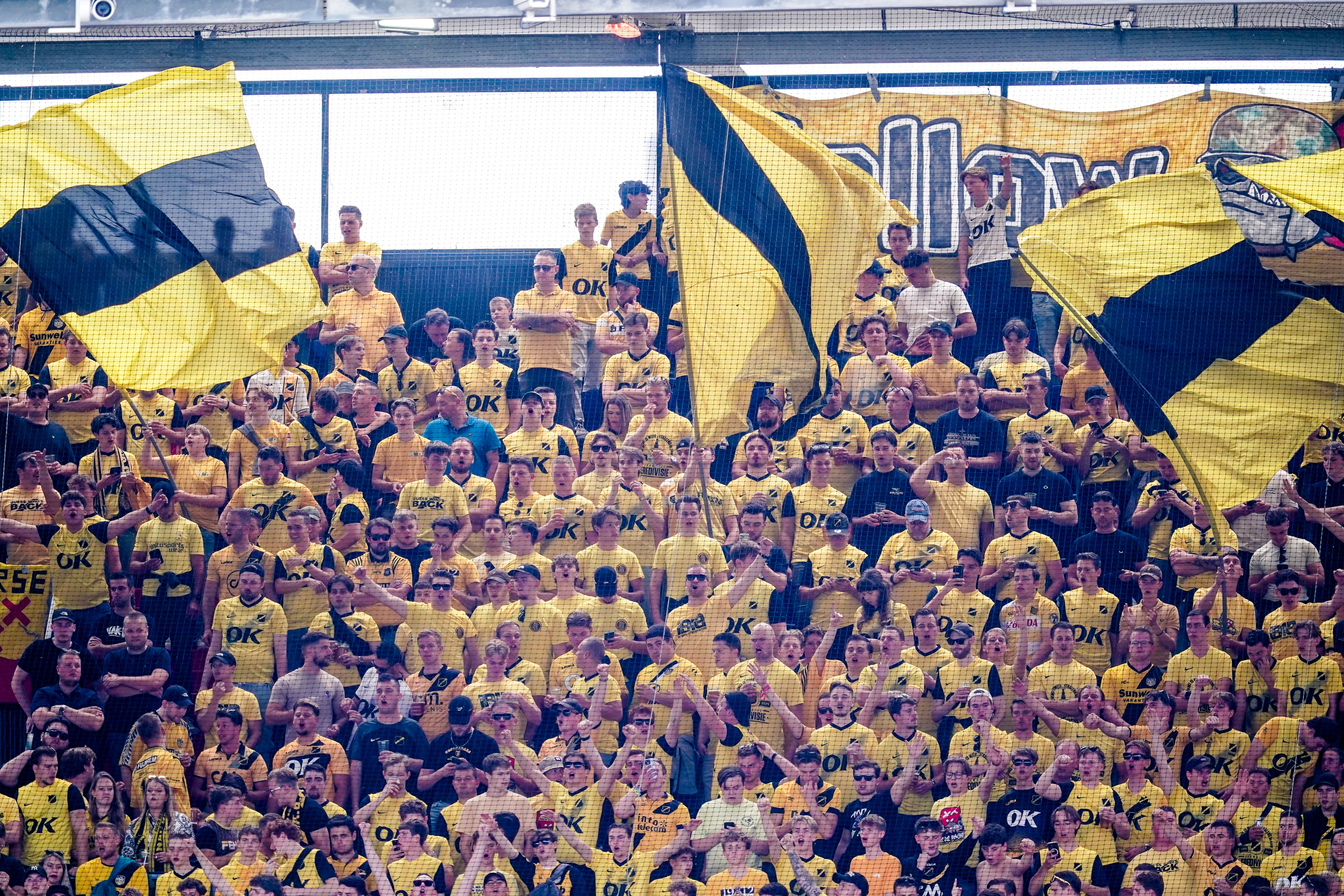 Fans van NAC in het uitvak van Feyenoord