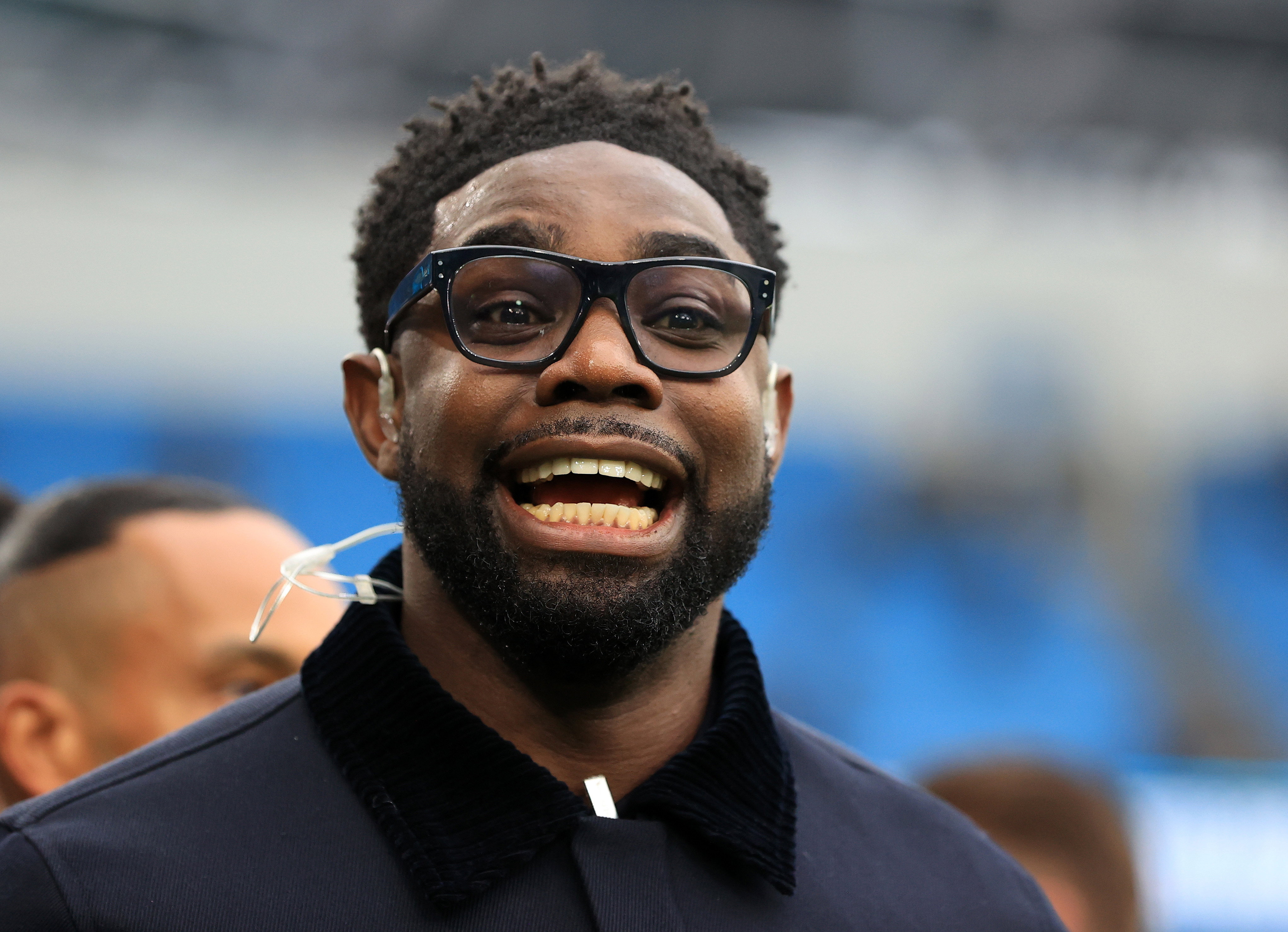 Een lachende Micah Richards
