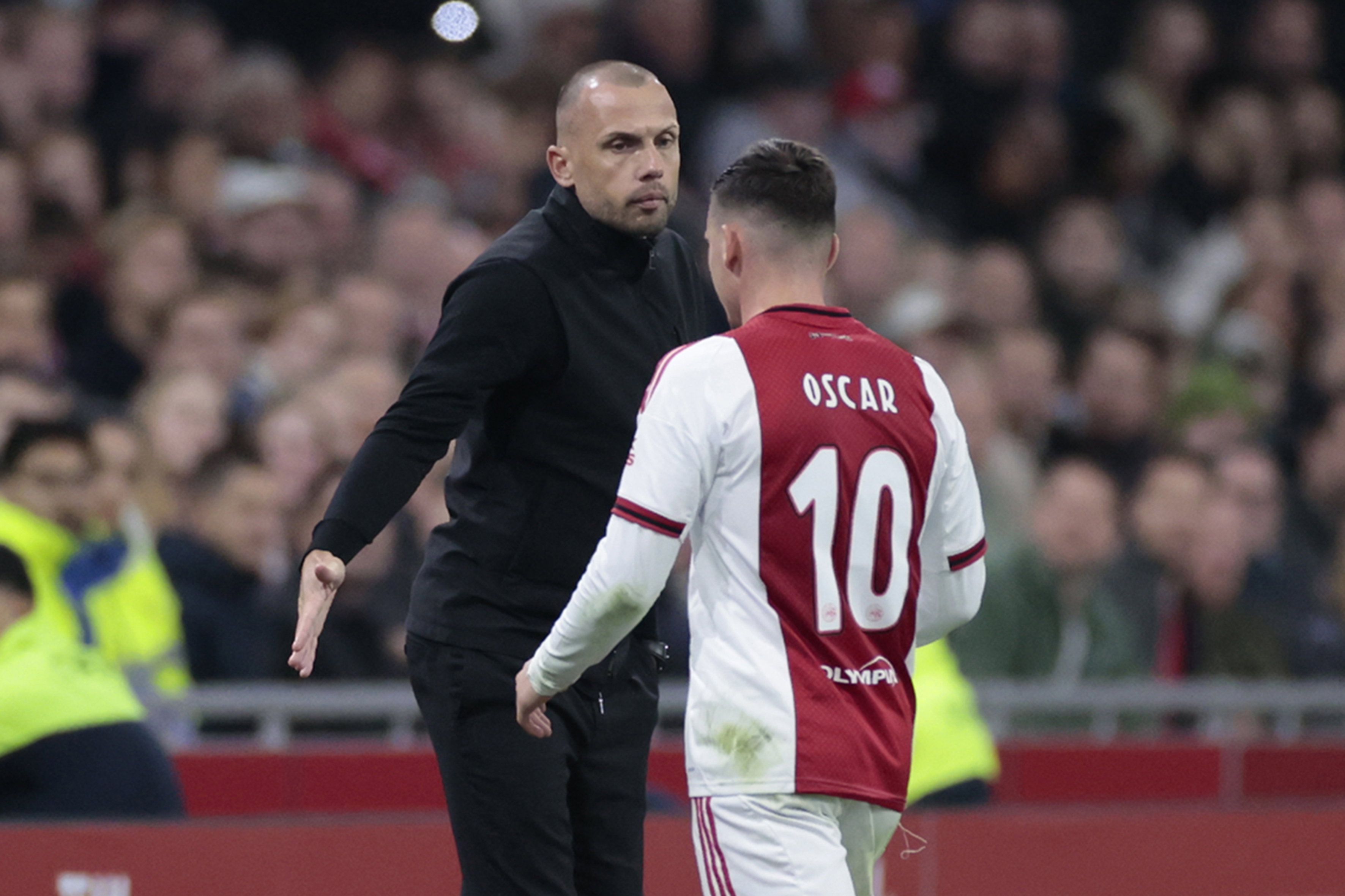 Oscar Gloukh en John Heitinga