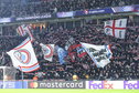 Supporters van PSV in het Philips Stadion tijdens een Champions League-wedstrijd