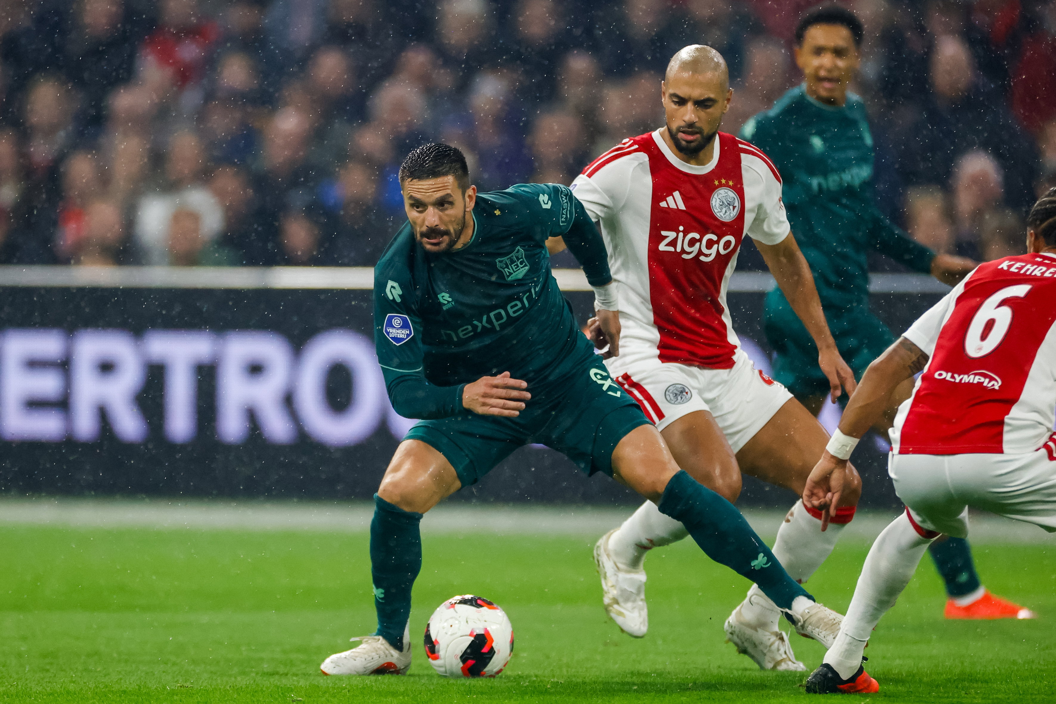Dusan Tadic en Sofyan Amrabat