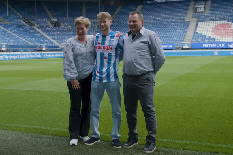 Een trotse Robin Bouw met zijn ouders
