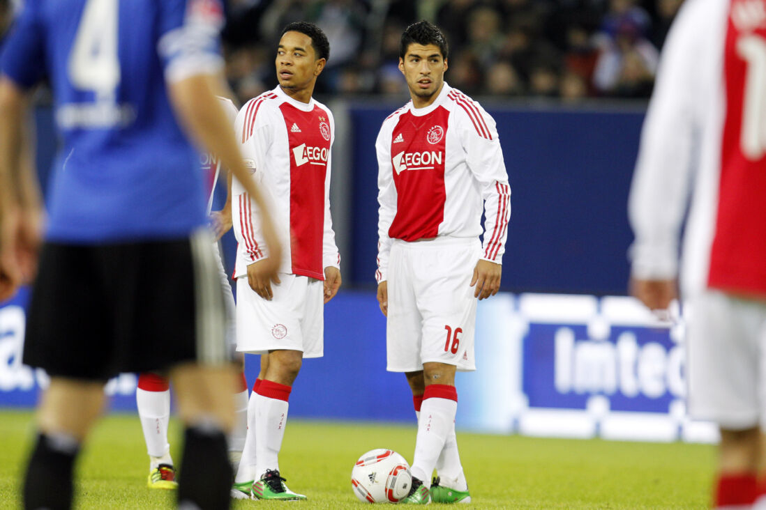 Urby Emanuelson en Luis Suarez
