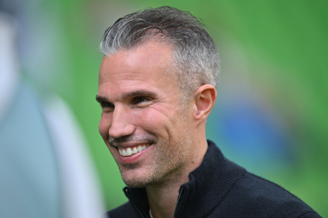 Robin van Persie met een grote glimlach op zijn gezicht