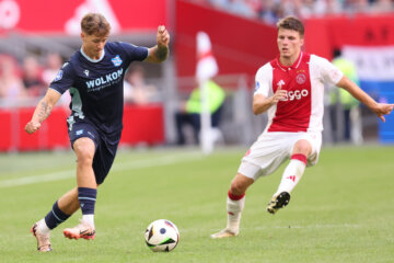 Dimitris Rallis in actie tegen Ajax