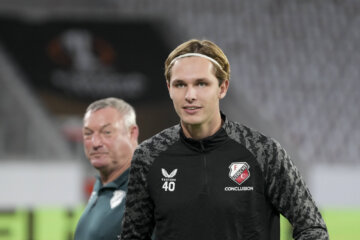 Matisse Didden met in de achtergrond Ron Jans