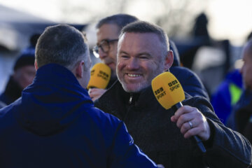 Een lachende Wayne Rooney