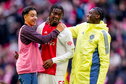Rayane Bounida, Don-Angelo Konadu en Jorthy Mokio zijn blij na een zege in de Johan Cruijff Arena