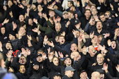 Ajax-supporters aan het zingen in een Europese uitwedstrijd