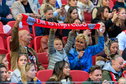 Ajax-supporters tonen een sjaal in de Johan Cruijff Arena