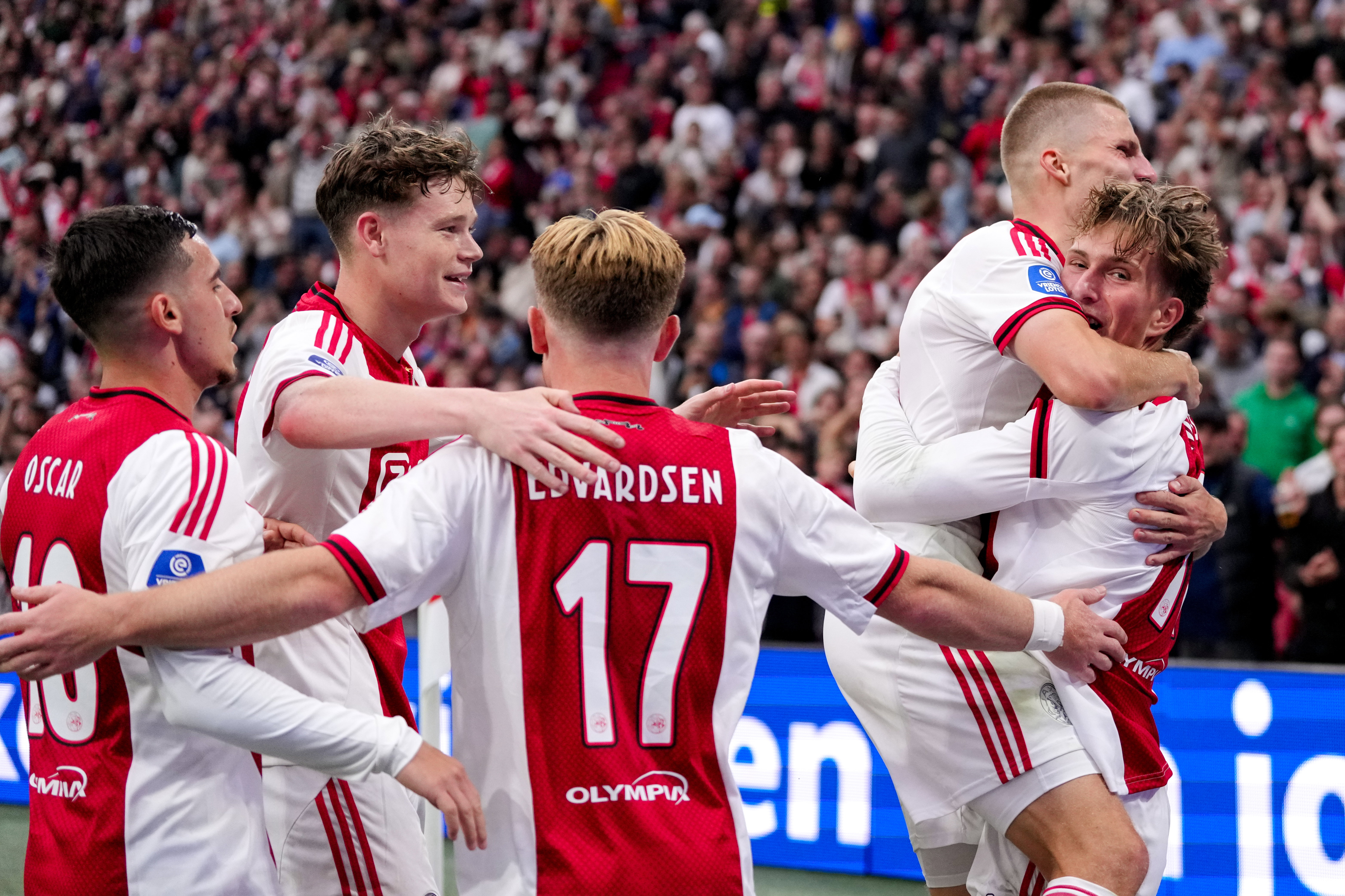 Mika Godts wordt gefeliciteerd na een goal in de Johan Cruijff Arena