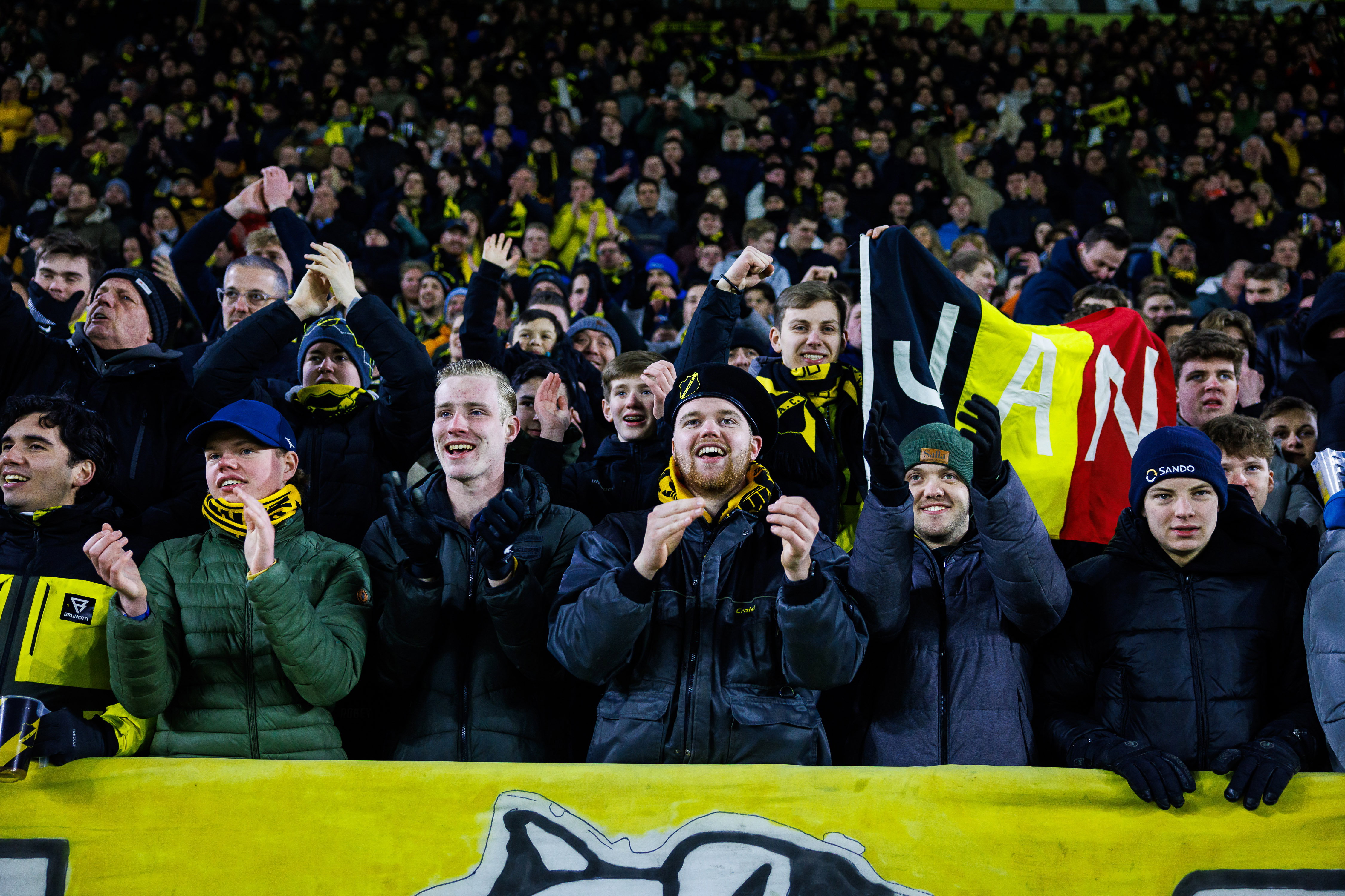 NAC Breda-fans met een spandoek voor Jan van den Bergh