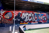Ajax-fans met een sfeeractie in het uitvak