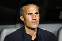 Robin van Persie kijkt toe vanuit de dug-out